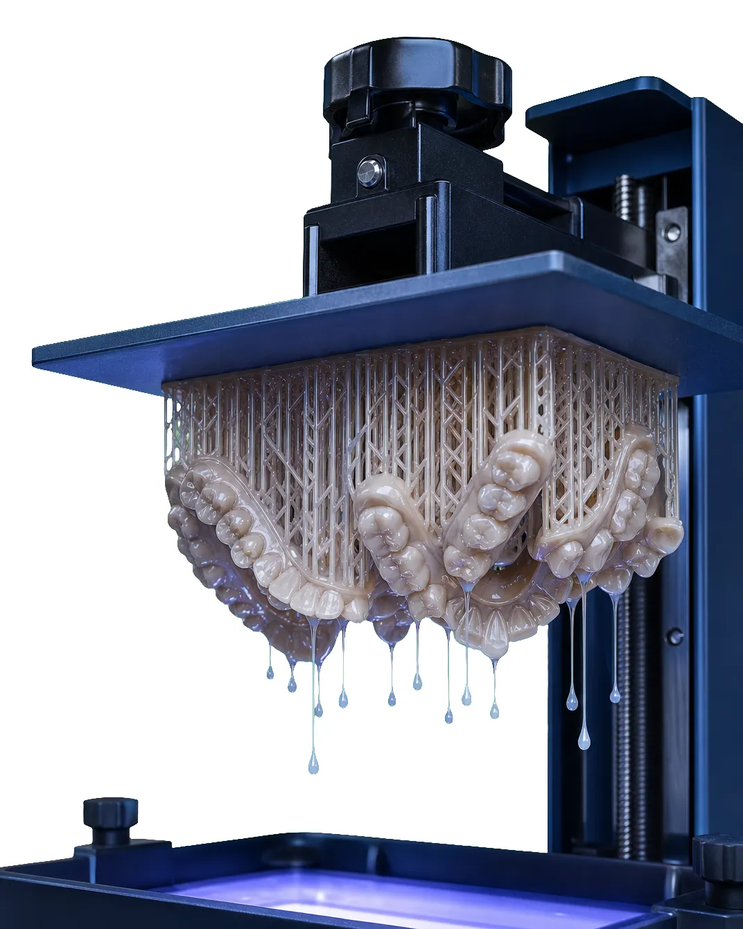 Resin 3D printer with the build plate raised from the vat, a full arch of printed dental parts on the plate still dripping uncured resin.