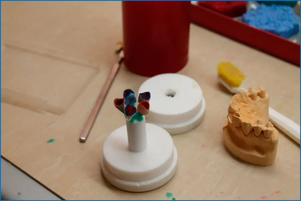 Sprued castable pattern in a casting ring, ready to invest